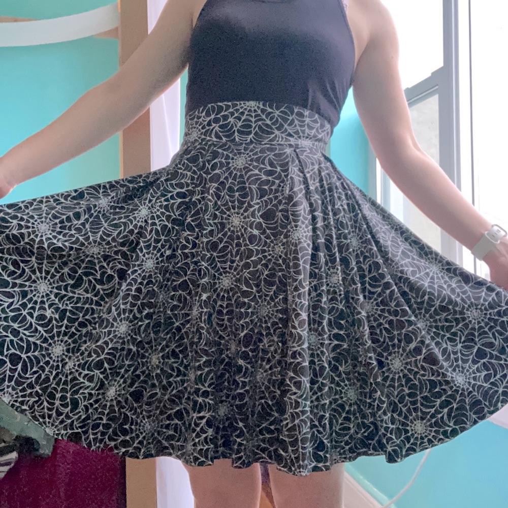 Pinup Couture Little Jun Pleated Skirt in Black Widow Spiderweb Print, Size S